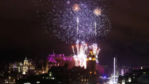 PA Fireworks over Edinburgh Castle during Hogmanay