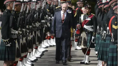 PA Members of Balaklava Company, 5th Battalion The Royal Regiment of Scotland, form a guard of honour for Richard Scott, 10th Duke of Buccleuch, as he is welcomed to Holyrood Palace in Edinburgh in his role as Lord High Commissioner, the Queen"s representative at the Church of Scotland General Assembly.
