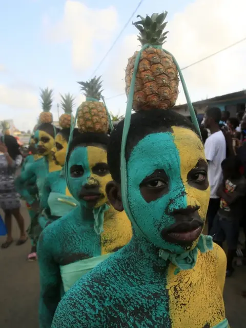 EPA Ivorians take part in a parade on the last day of the 38th Popo Carnival in Bonoua, 60km south of Abidjan, Ivory Coast, 14 April 2018. The carnival of Bonoua is the Ivoirians version of Mardi Gras running for a week. Derived from at first a celebration of the cultural heritage of the Aboure people, the Popo Carnival involves gastronomic competitions, Miss pageants, sports days, a festival of traditional dances and reflection workshops on Popo museum amongst other activities.