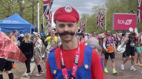 PA Media Simon Killen at the end of the race