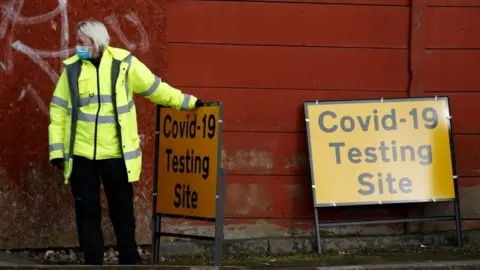 A woman at a Covid-19 testing site