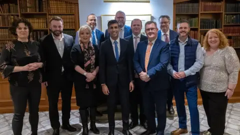Simon Walker / No10 Downing Street Clare Hanna, Colum Eastwood, Michelle O'Neill, Chris Heaton-Harris, Rishi Sunak, Doug Beattie, Gordon Lyons, Sir Jeffrey Donaldson, Stephen Farry, Robbie Butler and Naomi Long