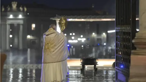 EPA Pope gives blessing to empty square