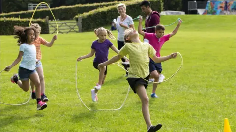 Getty Images Skipping children