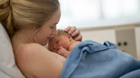 Getty Images Mother and baby