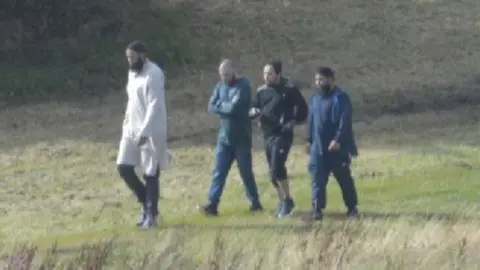 West Midlands Police Convert photo of the four men meeting