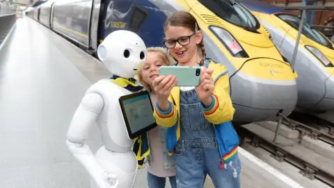 Tabatha Fireman Pepper, Eurostar's robot, helps passengers with their travels