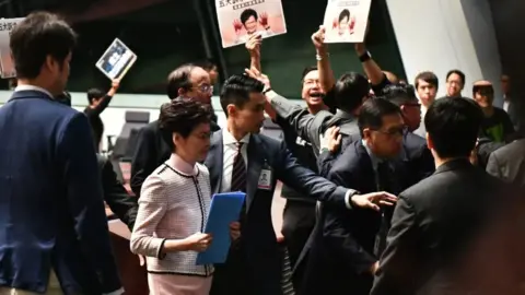 AFP Carrie Lam leaving Wednesday's session