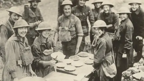 Salvation Army USA Troops receive donuts in an undated photograph from World War One