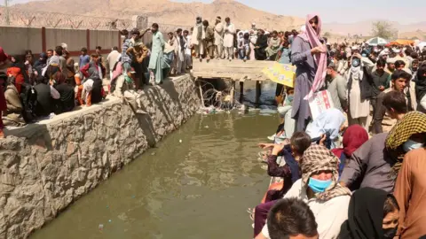 EPA People crowded outside Kabul airport