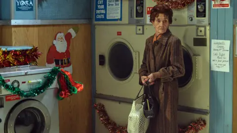 June Brown as Dot Cotton