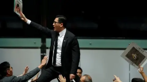 Reuters Protests began as soon as Carrie Lam arrived