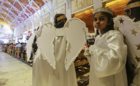 EPA Sri Lankan Catholic children dressed up as angels