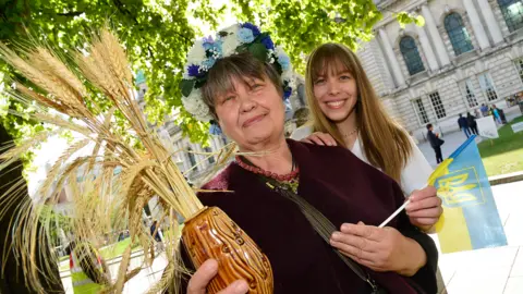 Pacemaker Victoria Perykash and Nadiya Kozyshko were among those who gathered at City Hall