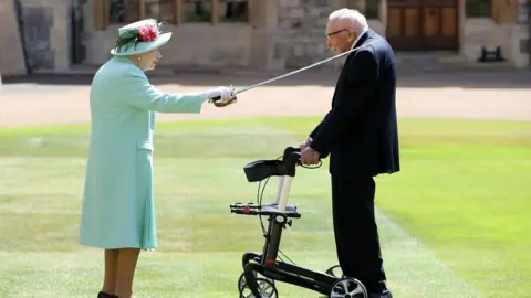 Getty Images The Queen and Capt Tom Moore