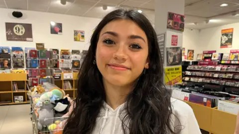 Qays Najm/BBC Lola, 14, at HMV in Norwich