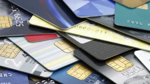 Getty Images Pile of credit cards