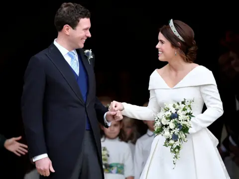 Reuters Jack Brooksbank and Princess Eugenie leave St George's Chapel