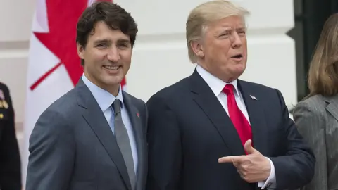 Getty Images US President Donald Trump (R) and Canadian PM Justin Trudeau