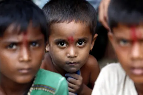 EPA Hindu children gather at the temporary camp in Maungdaw township, Rakhine State, western Myanmar, 6 September 2017.