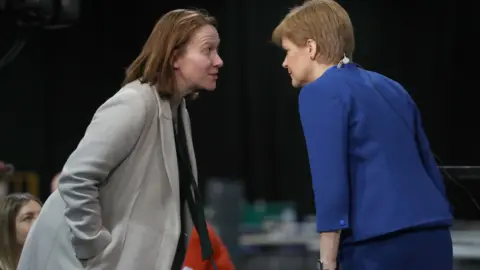 PA Media Liz Lloyd and Nicola Sturgeon