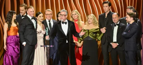 Getty Images Alan Ruck (C), Nicholas Braun, J. Smith-Cameron, Kieran Culkin and the cast of "Succession" win for Cast Ensemble in a Drama Series for "Succession" at the 30th Annual Screen Actors Guild Awards held at the Shrine Auditorium and Expo Hall on February 24, 2024 in Los Angeles, California.