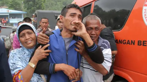 AFP Relatives of the victims