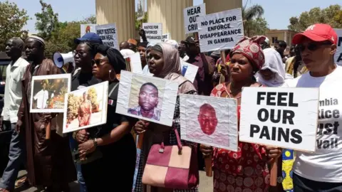 AFP Protesters in The Gambia calling for justice for those who disappeared during Mr Jammeh's time in office