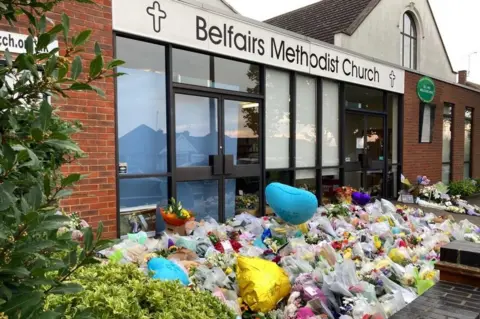 Richard Smith/BBC Floral tributes