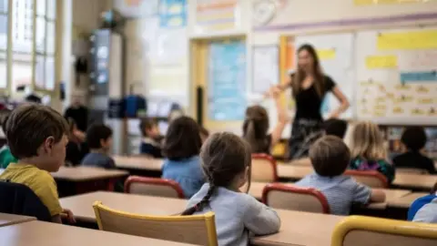 Getty Images Teacher in class