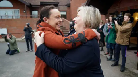 Jacob King/PA Wire Rhiannon Davies embraces Donna Ockenden following the release of final report