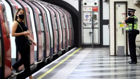 Reuters Tube commuter