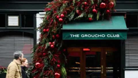 The Groucho Club entrance dressed with festive baubles