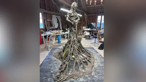 Petrified Survivors A wide view showing the full sculpture being created in the art studio