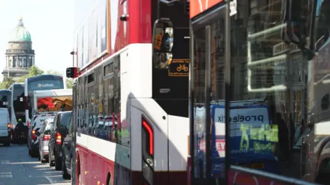 A line of traffic heading towards Charlotte Square in Edinburgh