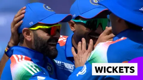 Indian cricketers celebrating