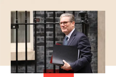 Getty Images Keir Starmer carrying documents arsenic  helium  walks.