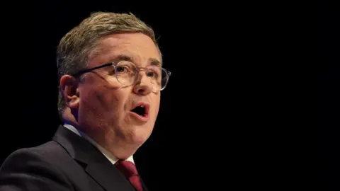 PA Sir Robert Buckland speaking