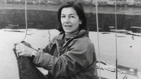 Phyll Babb Black and white photo of Phyll Babb as a younger woman on a boat