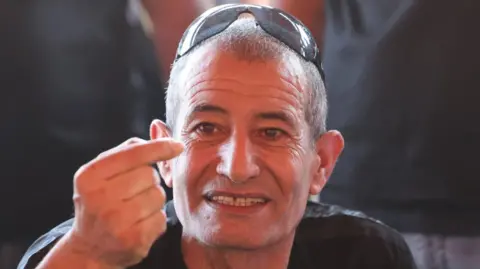 Kaid Farhan Elkadi speaks to reporters. Photo: 28 August 2024