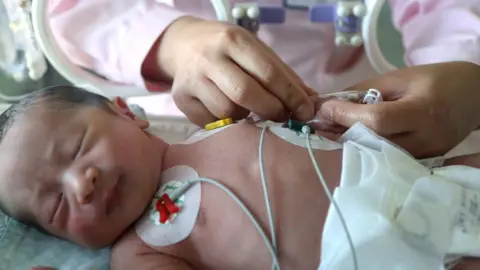 Getty Images New born baby in China