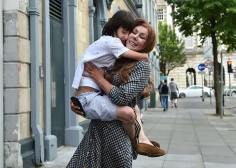 Getty Images charlotte caldwell hugging her son billy