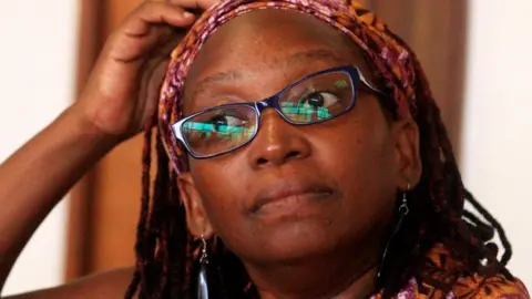 Reuters Ugandan prominent academic Stella Nyanzi stands in the dock at Buganda Road Court