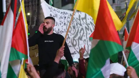 Muath Khatib Protesters in Ramallah chant in support of Gaza