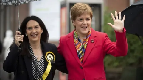 PA Media Margaret Ferrier with Nicola Sturgeon