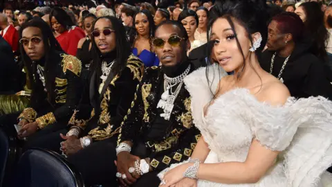 Getty Images Migos with Cardi B at the 2018 Grammy Awards