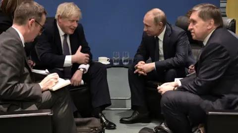 Getty Images/Alexei Nikolsky UK Prime Minister Boris Johnson and Russia President Vladimir Putin