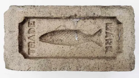 Chris Tilney Brick stamped with the trademark of a salmon