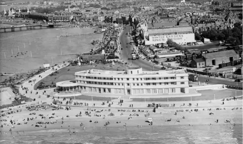 Historic England Archive / Aerofilms Collection An aerial view of The Midland Hotel and the sea-front in Morecambe, taken in August 1934