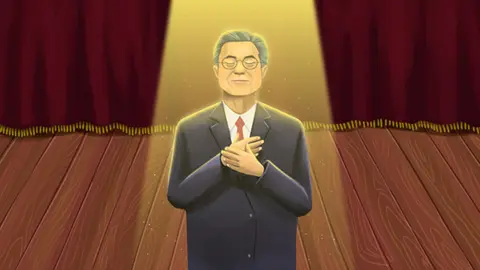 BBC/DaviesSurya An illustration of South Korean President Moon Jae-in standing on a theatre stage with his hands in front of his chest, looking upwards.